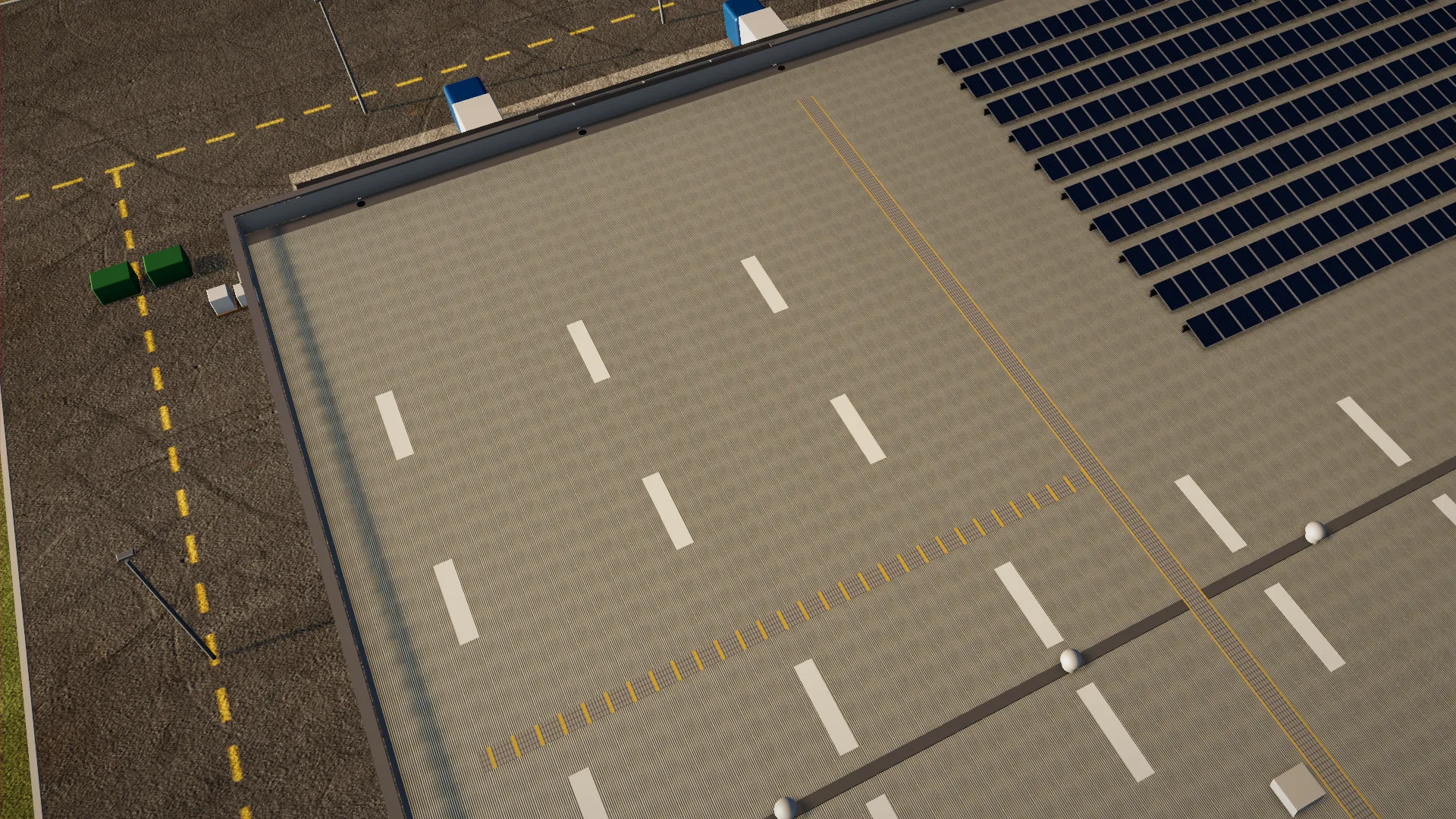 3D model of a warehouse in thermal colours, with markers on the solar panels that need attention.